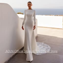 Ivory Mermaid Wedding Dress Customized Boat Neck Long Sleeves Illusion Back Buttons Sequined Applique Bridal Gown Court Train