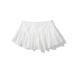 YENKYE Cool Girl Hollow Out Embroidery White Mini Skirt For Women Sexy Low Waist Summer Skirts With Shorts Lining
