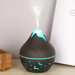 Mini Snow Mountain Hollow out Wood Grain Aromatherapy Humidifier USB Silent Air Moisturizer