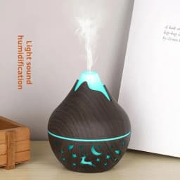 Mini Snow Mountain Hollow out Wood Grain Aromatherapy Humidifier USB Silent Air Moisturizer