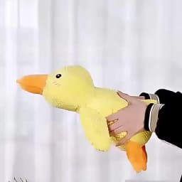 Dog sleeping with a dog hug duck toys to relieve boredom of little yellow duck pet interactive plush doll pet supplies