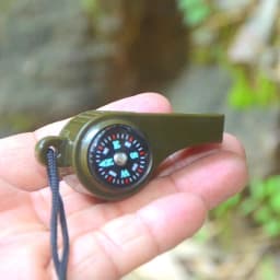 Jungle Survival Whistle with Compass Mirror Flashlight Magnifier LED Light Thermometer Storage Hiking Tool