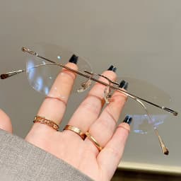 YIMARUILI Ultralight Fashion Cat Eye Rimless Glasses Women Retro Titanium Alloy Retouch Face Optical Prescription Framework 690A
