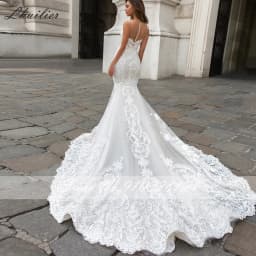 Lhuilier Customized Mermaid Lace Wedding Dresses Illusion Scoop Neck Lace Appliques Chapel Train Bridal Gown with Cape