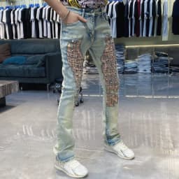 New Splicing Ripped Jeans Men's Rivet Decoration Mens Jeans Brand 2026 Fashion Trendy Versatile Long Pants Jeans Masculina