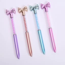 10Pcs/Lot Cute Bow Knot Ballpoint Pens Bow-tie Rotating Crystal Writing Gel Pen Black Blue Ink Office Supplies School Stationery