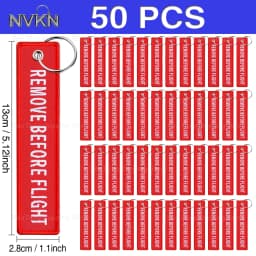 50Pcs Aviation‑style keychain: embroidered red ribbon with white text “Remove Before Flight” for backpacks & cars key ring