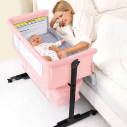 Baby Bedside Bassinet, Height‑Adjustable Co‑Sleeper Bedside Crib with Mosquito Canopy, Sturdy I‑Shape Frame Portable Baby Bassinet with Storage Pocket & Lockable Wheels for Newborn Infant, 3‑Color Available Pink / Light Gray / Dark Gray