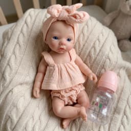 10 Inch Meadow Full Body Silicone Reborn Doll With Pink Outfit Lifelike Newborn Hand‑Painted Waterproof Collectible Art Ornament for Holiday & Birthday Gifts