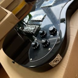 Solid wood electric guitar with bright black finish, maple fretboard, walnut body, dual pickups, Christmas gift, available in US warehouse, free shipping