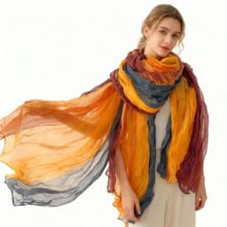This Is A Scarf With Natural Color Transitions And Artistic Flair. The Fabric Is Light And Soft With A Natural Wrinkled Texture That Not Only Adds To The Scarf's Three-Dimensionality But Also Enhances Its Casual And Elegant Charm