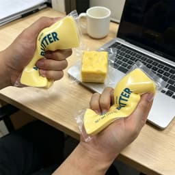 Best-selling stress-relief squishy butter cheese toy! Soft and smooth to squeeze with satisfying rebound. Cute yellow cube design with realistic detail—great as a gift, party favor, or daily stress toy.