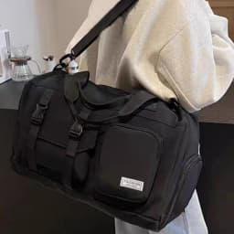 The Neutral Color Backpack for Men and Women Is Suitable for Travel and Can Be Carried by Hand or Worn on The Shoulder.