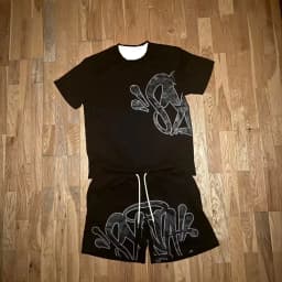 2026 Summer New Style Unisex Abstract Graffiti Graphic 2 Piece Tracksuit Black Tee and Elastic Waist Shorts for Kids Streetwear