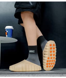 popular cross-border slippers men's and women's baotou hole shoes thick-soled eva stepping on shit massage recovery coolslippers