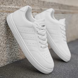 Men Classic Leather Skate Shoes Lace Up Flat Casual Sneakers Non Slip Daily Walking Footwear Black White 2 Colors