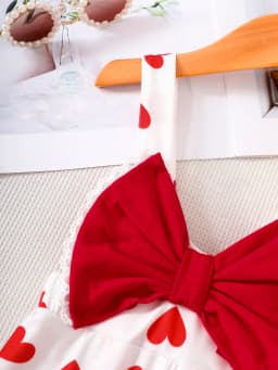 Baby Girl's Heart-Printed Flared Jumpsuit with Big Red Bow Shoulder Straps, Sweet Valentine's Day Princess-Style Summer Outfit