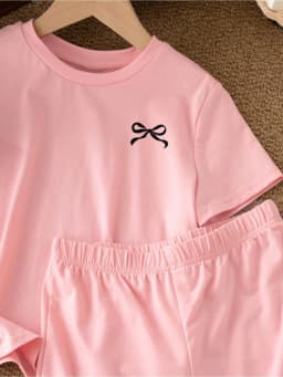 2026 Casual Children's Clothing Solid Color Printed Round Neck Short Sleeved Top + Solid Color Printed Wide Leg Shorts Pants Set