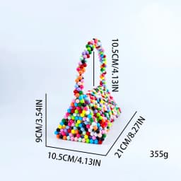 European and American same niche handmade color-blocked pearl triangle bag, fashionable and versatile hand-held bead bag