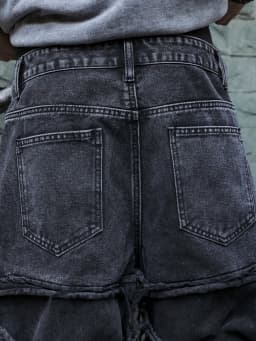 Men's Black Jeans. With a Design of (Ripped Holes) and Tassels. In a Street Trend Style.