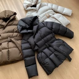 Lagabogy 2025 New Winter Women Hooded Thick Loose 90% White Duck Down Jacket Female Elegant Lightweight Puffer Coat With Belt