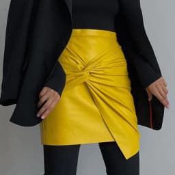 Women Design Sense French Leather Skirt Fashion High Waist Slimming Folds Knot Mini Skirts Sexy Package Hip PU Short Skirts