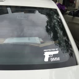 Protected By The Gun 9MM Bumper Vinyl Car Sticker Gun Ammo Decor