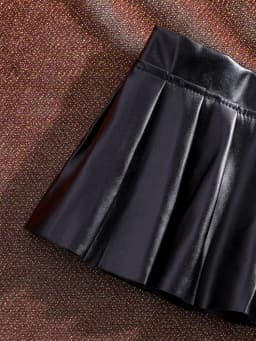 Sexy PU Leather Pleated Skirt Women Solid Basic Mini Skirt Low Waist Skirt Female Nightwear Micro Bikini Skirts Nightclub Skirts