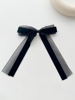 A piece of elegant velvet netting hair accessory featuring double bow hairpins for ladies, suitable for formal events.