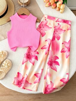 Girls' orange vacation-style two-piece set: a solid-color, ribbed, sleeveless mock-neck crop top paired with lily-print, flowy w