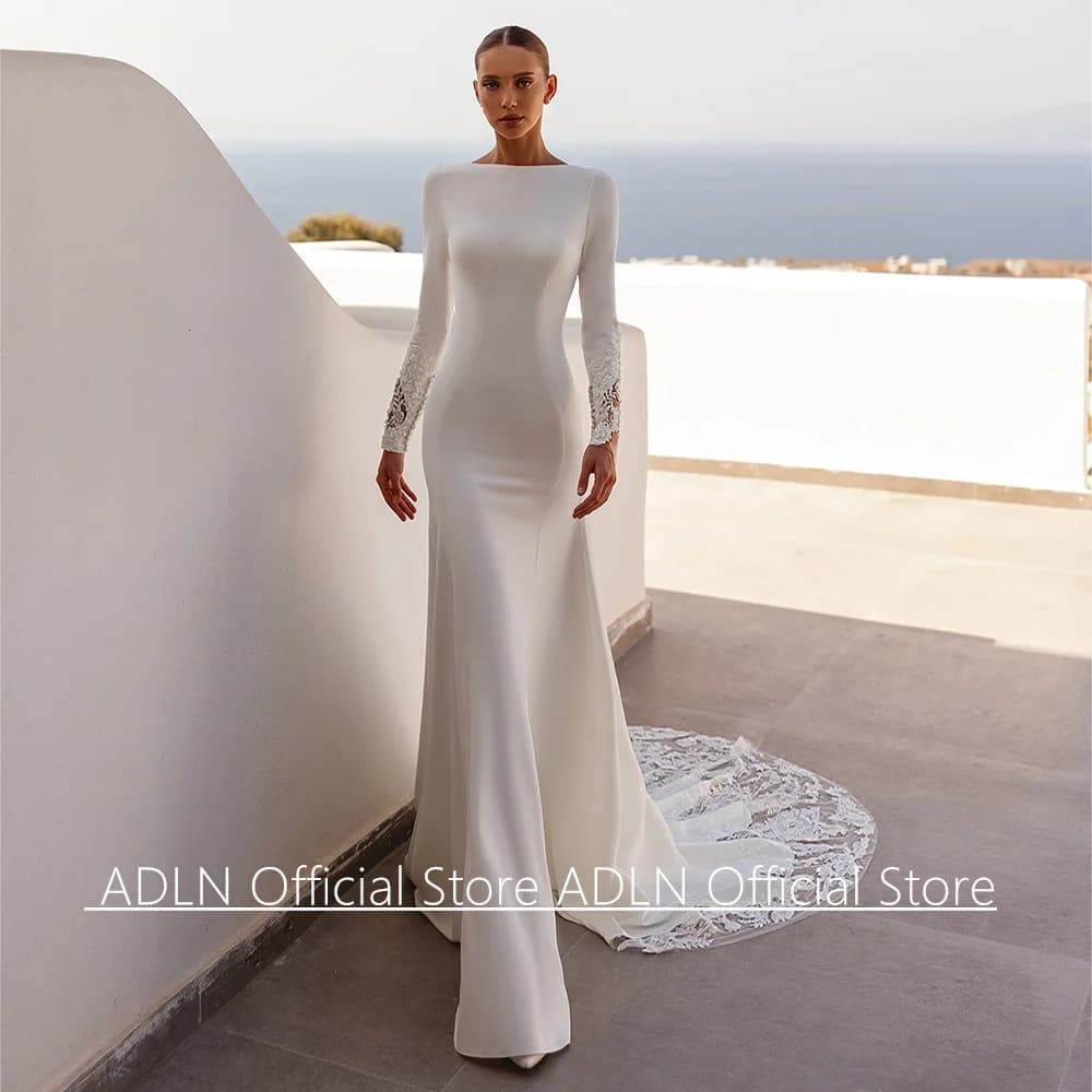 Ivory Mermaid Wedding Dress Customized Boat Neck Long Sleeves Illusion Back Buttons Sequined Applique Bridal Gown Court Train